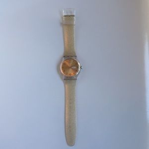 Gold swatch watch great condition!